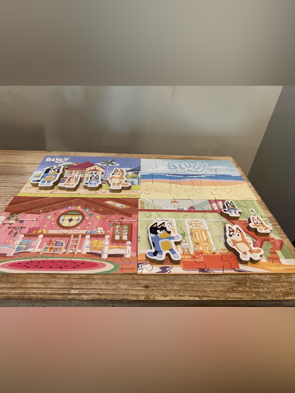 4 Wooden Bluey Puzzles with 8 interchangeable Wooden Bluey Characters. - Picture 2 of 4